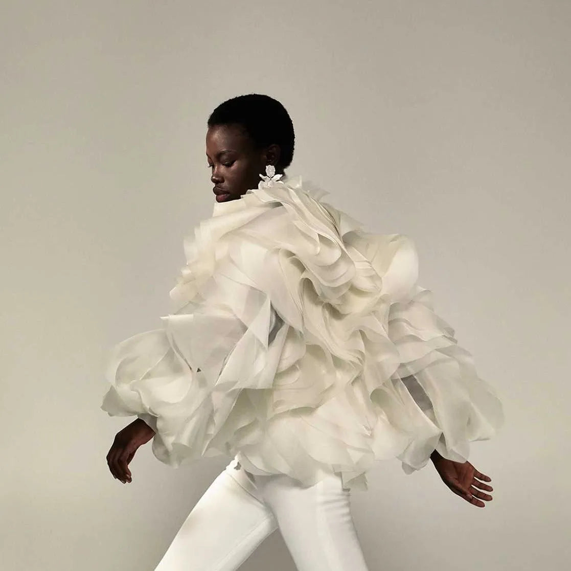 Avant-garde unique suit with voluminous ruffles and modern silhouette